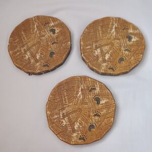 4/$40 Set of Three Textured Coasters with Engraved Footprint Design